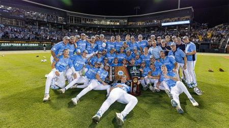 The Carolina baseball team posing for a group celebration photo at Boshamer Stadium